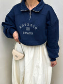 Urban Zip-Collar Embroidered Top